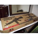 A boxed Airsoft assault rifle ICS