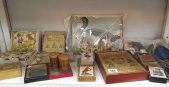 A shelf of vintage puzzles, games, jigsaws, cards etc.