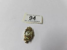 A ladies 9ct gold and enamel watch head.