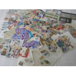 A large quantity of loose stamps.