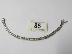 A white gold 38 stone diamond bracelet.