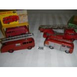 A boxed Dinky Airport fire tender and 3 other fire engines.