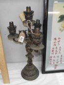 An electrified bronze 3 arm candelabra (wiring a/f)