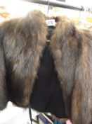 A fur cape (In good condition).