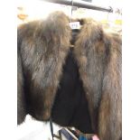 A fur cape (In good condition).