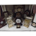A large quantity of carriage and mantle clocks.