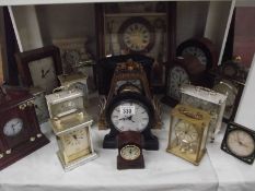 A large quantity of carriage and mantle clocks.