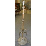 A good Edwardian silver plate adjustable standard lamp base, needs rewiring.