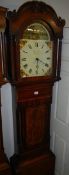 A mahogany inlaid 30 hour long case clock with painted dial by Thos. Yates, Penrith.