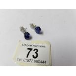 A pair of 14ct gold diamond and sapphire earrings.