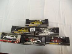 6 boxed Scalextric cars including Mini TR7 etc.
