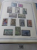 A good collection of Spanish stamps in 5 albums plus reference books.
