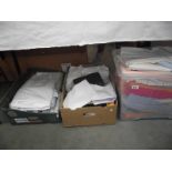 3 boxes of assorted bedding.