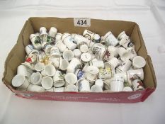 A box containing over 100 thimbles