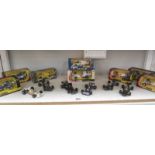 A collection of Corgi Formula 1 racing cars, boxed and unboxed,