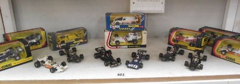 A collection of Corgi Formula 1 racing cars, boxed and unboxed,