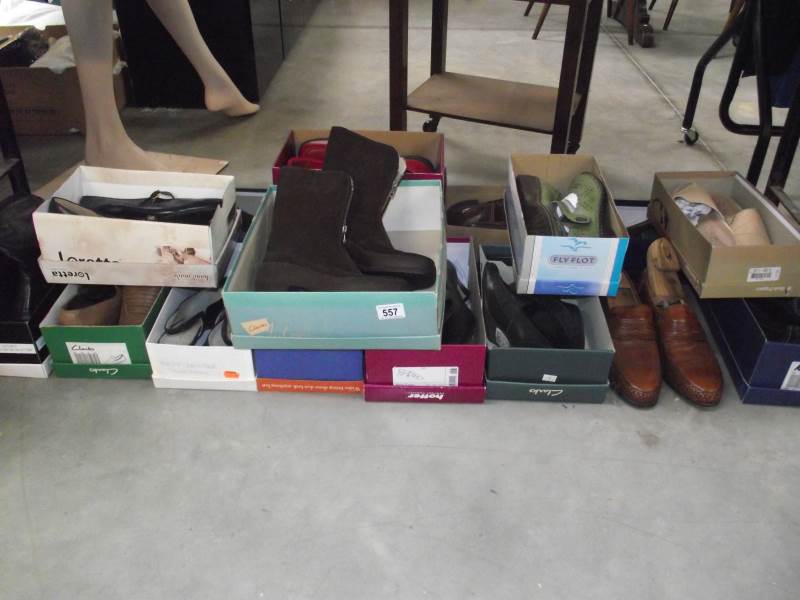 A quantity of new and used shoes.