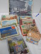 A quantity of vintage wooden jigsaw puzzles.