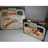 A boxed Palitoy Star Wars Land Speeder and X wing fighter,
