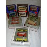 Eight construction themed die cast vehicle and 15 other vehicles.