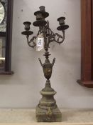 A bronze 4 arm candelabra