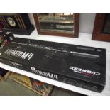 A boxed Airsoft SOPMODM4 gun by Tokyo Marui Co Ltd.