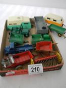 A mixed lot of Dinky caravans, trailers and farm implements etc.