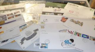 Fifteen first day covers.