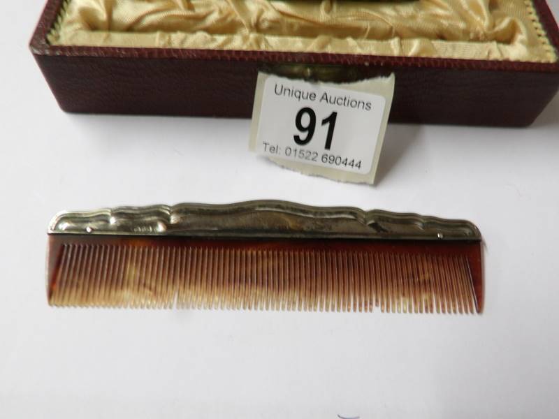 A cased silver backed hair brush and comb. - Image 2 of 3