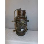 A large brass ships lamp, a/f (missing burner and glass cracked).