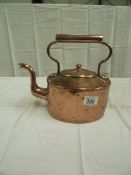 A vintage copper kettle