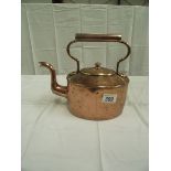 A vintage copper kettle
