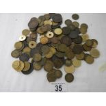 A box of assorted coins including George III, Victorian gaming tokens etc.