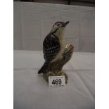 A Beswick Lesser Spotted Woodpecker No 2429 ( a/f underneath on tip of tail,