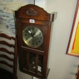 An Edwardian wall clock, in working order.