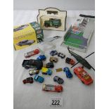 A small quantity of micro machines including folding garage.