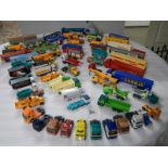 In excess of 60 cars and lorries, die cast and plastic.