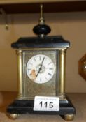 A brass and marble Dresden musical carriage clock.