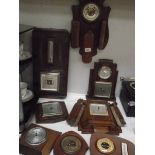 A quantity of assorted oak 1930-50's barometers (one with cracked glass).