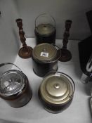 4 oak biscuit barrels and a pair of barley twist candlesticks.