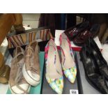 Five pairs of shoes, Kurt Geiger pair size 6, Paul Smith, Nine West and 2 other pairs.