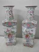 A pair of square based Chinese vases, 42 cm tall.