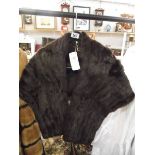 A stylist fur cape by The Fur Room, Rackhams, ideal for wedding cape. (in very good condition).