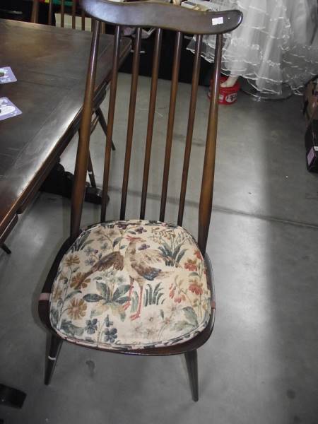 A dark oak draw leaf table and 4 Ercol chairs. - Image 2 of 4