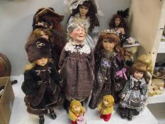 A good selection of porcelain headed collector's dolls.