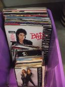 A mixed lot of LP and 45 rpm records including Michael Jackson, Madonna etc.