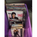 A mixed lot of LP and 45 rpm records including Michael Jackson, Madonna etc.