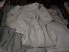 4 early 20th century Christening dresses with lace embroidery plus dolls clothes etc.