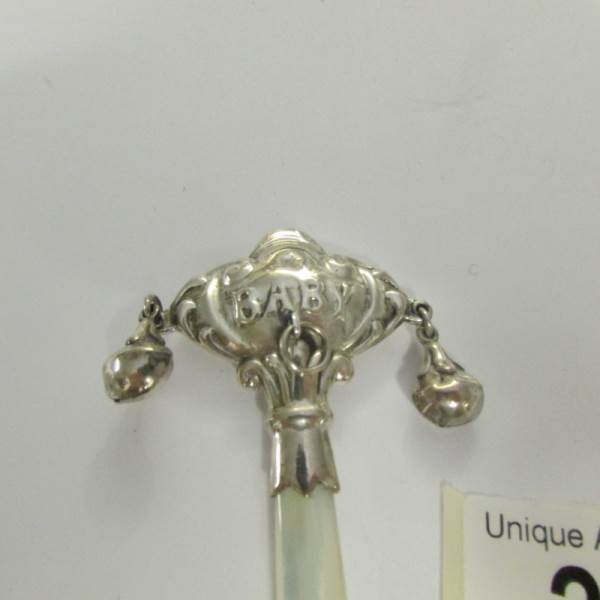 A silver rattle with mother of pearl handle. - Image 3 of 3