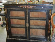 A good double door inlaid pier cabinet in good condition.